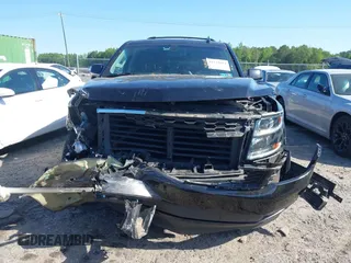 2019 Chevrolet Suburban LS with VIN 1GNSKGKC2KR353977, listed as a IAAI auction lot 42129814 with 85,454 mi miles and . Bid and sale history available at DreamBid. Image 12.