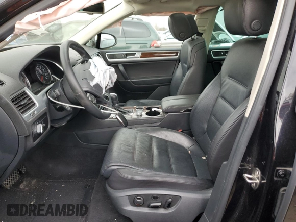 2016 Volkswagen Touareg Sport with VIN WVGEF9BP4GD011455, listed as a Copart auction lot 49734885 with 145,450 mi miles and Salvage Title. Bid and sale history available at DreamBid. Image 7.