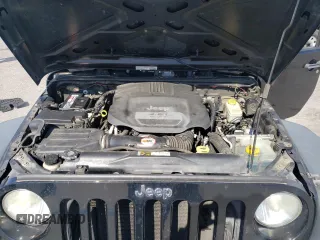 2013 Jeep Wrangler Unlimited Freedom z VIN 1C4BJWDGXDL702914, wystawiony jako Copart lot #49461175 z przebiegiem 191 610 mil mil oraz Czysty tytuł • Clean title. Historia ofert i sprzedaży dostępna na DreamBid. Obrazek 11.