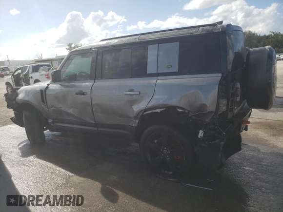 2023 Land Rover Defender X with VIN SALEXEEU6P2136280, listed as a Copart auction lot 77014604 with 27,736 mi miles and Salvage title. Bid and sale history available at DreamBid. Image 2.
