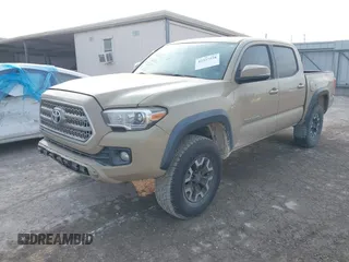 2017 Toyota Tacoma SR5 with VIN 5TFCZ5AN7HX097307, listed as a IAAI auction lot 42337528 with 98,000 mi miles and . Bid and sale history available at DreamBid. Image 18.