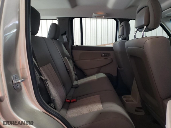 2010 Jeep Liberty Sport with VIN 1J4PN2GK9AW143878, listed as a Copart auction lot 52851095 with 121,357 mi miles and Salvage Title. Bid and sale history available at carsss.com. Image 11.