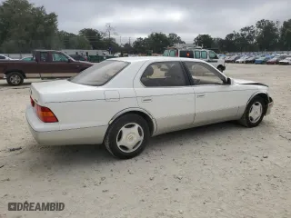 1998 Lexus LS 400 Luxury Sdn with VIN JT8BH28F4W0121580, listed as a Copart auction lot 86534644 with 143,254 mi miles and Salvage Title. Bid and sale history available at carsss.com. Image 3.