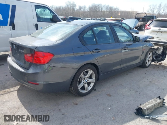 2014 BMW 3 Series 328i xDrive with VIN WBA3B3G5XENR83156, listed as a IAAI auction lot 41803982 with 111,318 mi miles. Bid and sale history available at carsss.com. Image 4.