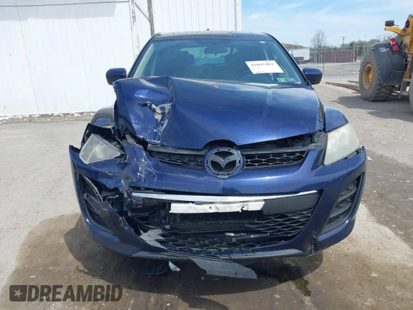 2011 Mazda CX-7 i Sport with VIN JM3ER2BM2B0402765, listed as a IAAI auction lot 42095402 with 206,502 mi miles and . Bid and sale history available at carsss.com. Image 12.