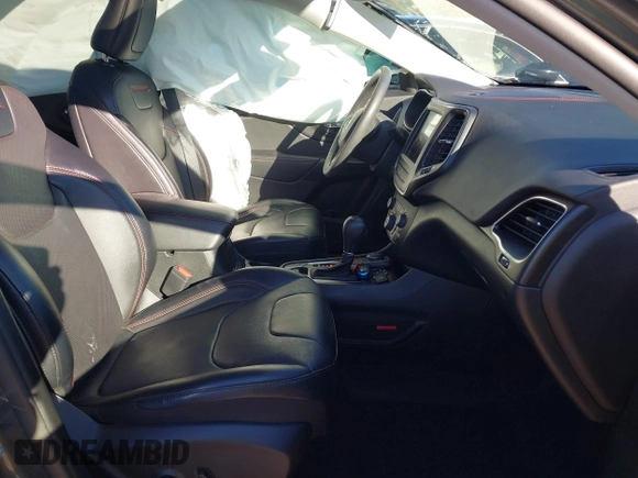 2022 Jeep Cherokee Trailhawk with VIN 1C4PJMBX9ND522235, listed as a IAAI auction lot 41738257 with 24,911 mi miles and . Bid and sale history available at DreamBid. Image 5.