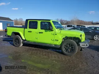 2021 Jeep Gladiator Willys with VIN 1C6HJTAG7ML612155, listed as a Copart auction lot 42627425 with 28,509 mi miles and Salvage Title. Bid and sale history available at carsss.com. Image 4.