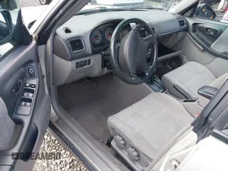 2001 Subaru Forester L with VIN JF1SF635X1H735028, listed as a IAAI auction lot 41805026 with 132,843 mi miles. Bid and sale history available at carsss.com. Image 5.