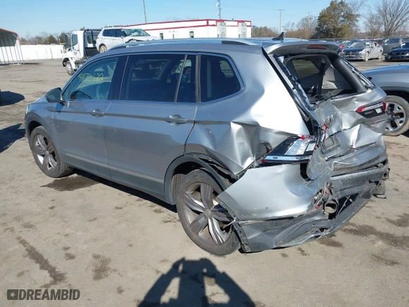 2020 Volkswagen Tiguan SE with VIN 3VV2B7AX0LM141970, listed as a IAAI auction lot 41633622 with 64,737 mi miles. Bid and sale history available at carsss.com. Image 3.