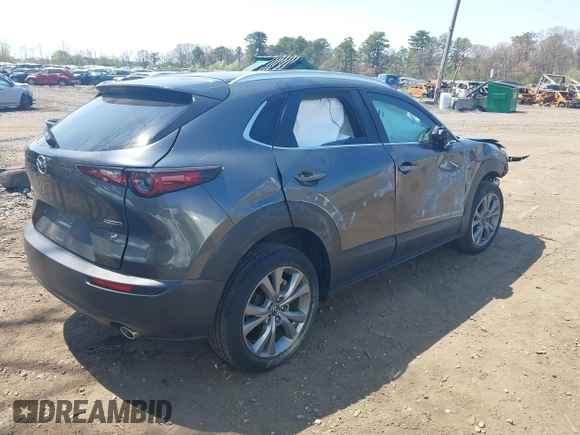 2024 Mazda CX-30 S Carbon Edition z VIN 3MVDMBCM0RM662752, wystawiony jako IAAI lot #42108251 z przebiegiem 17 963 mil mil oraz . Historia ofert i sprzedaży dostępna na DreamBid. Obrazek 4.