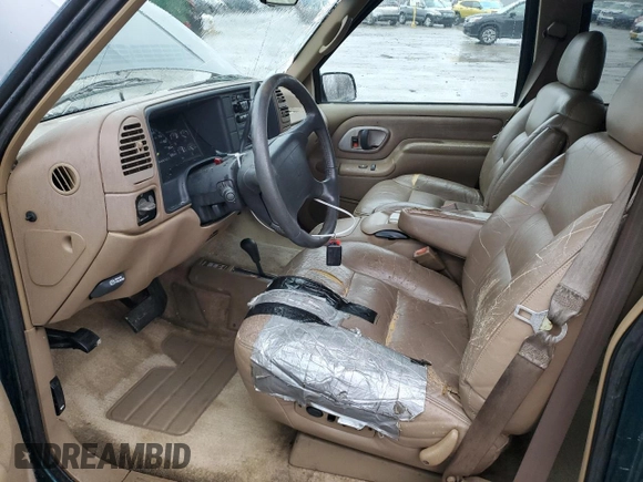 1995 GMC Suburban z VIN 1GKFK16K0SJ748087, wystawiony jako Copart lot #85121834 z przebiegiem 191 550 mil mil oraz Szkoda całkowita • Salvage title. Historia ofert i sprzedaży dostępna na DreamBid. Obrazek 7.