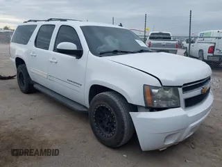 2013 Chevrolet Suburban LT with VIN 1GNSCJE05DR147101, listed as a IAAI auction lot 42336950 with 147,429 mi miles and . Bid and sale history available at DreamBid. Image 1.