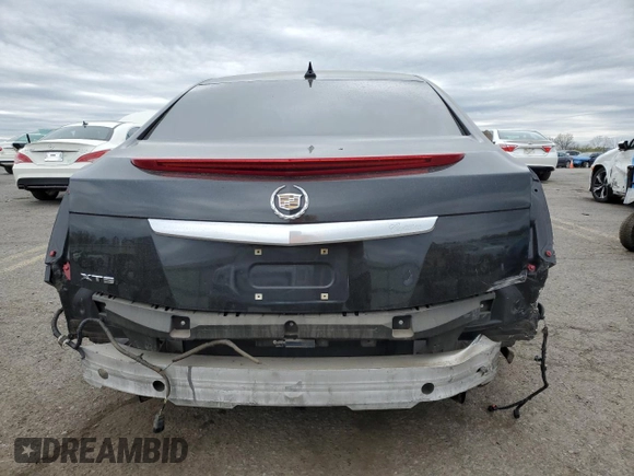 2013 Cadillac XTS Luxury z VIN 2G61R5S37D9127597, wystawiony jako Copart lot #53841755 z przebiegiem 81 603 mil mil oraz Szkoda całkowita • Salvage title. Historia ofert i sprzedaży dostępna na DreamBid. Obrazek 6.