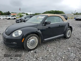 2013 Volkswagen Beetle 2.5L with VIN 3VW5X7AT1DM830974, listed as a Copart auction lot 51870695 with 63,981 mi miles and Salvage title. Bid and sale history available at DreamBid. Image 1.
