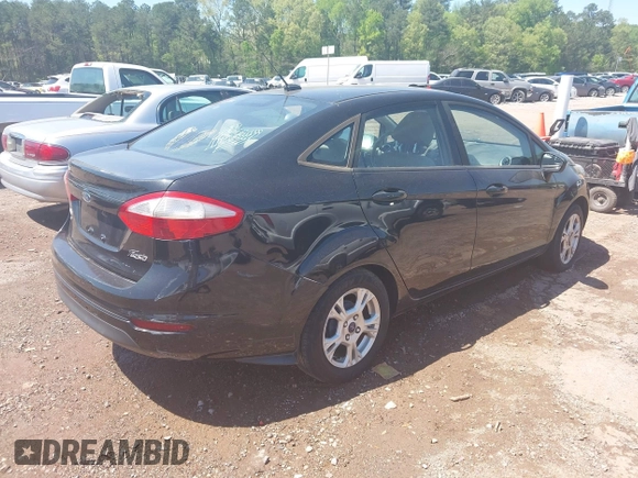 2015 Ford Fiesta SE with VIN 3FADP4BJ9FM113645, listed as a IAAI auction lot 41970671 with 138,026 mi miles. Bid and sale history available at carsss.com. Image 4.