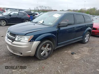 2013 Dodge Journey SE with VIN 3C4PDCAB6DT631140, listed as a IAAI auction lot 41833560 with 222,788 mi miles. Bid and sale history available at carsss.com. Image 2.