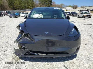 2025 Tesla Model Y Long Range with VIN 7SAYGAEEXSF253326, listed as a Copart auction lot 49527965 with 5,803 mi miles and Salvage Title. Bid and sale history available at DreamBid. Image 5.