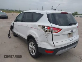 2016 Ford Escape SE z VIN 1FMCU0G79GUC41641, wystawiony jako IAAI lot #42103256 z przebiegiem 153 792 mil mil oraz . Historia ofert i sprzedaży dostępna na DreamBid. Obrazek 3.