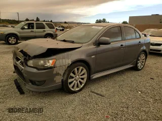 2011 Mitsubishi Lancer GTS with VIN JA32U8FW2BU005251, listed as a Copart auction lot 70879824 with 124,317 mi miles and Salvage Title. Bid and sale history available at carsss.com. Image 1.