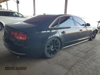 2011 Audi A8 z VIN WAURVAFD5BN019557, wystawiony jako Copart lot #54801035 z przebiegiem 148 688 mil mil oraz Tytuł czysty. Historia ofert i sprzedaży dostępna na DreamBid. Obrazek 3.