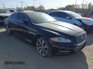 2015 Jaguar XJ with VIN SAJWA1CZ1F8V90549, listed as a IAAI auction lot 41817327 with 98,346 mi miles. Bid and sale history available at carsss.com. Image 1.