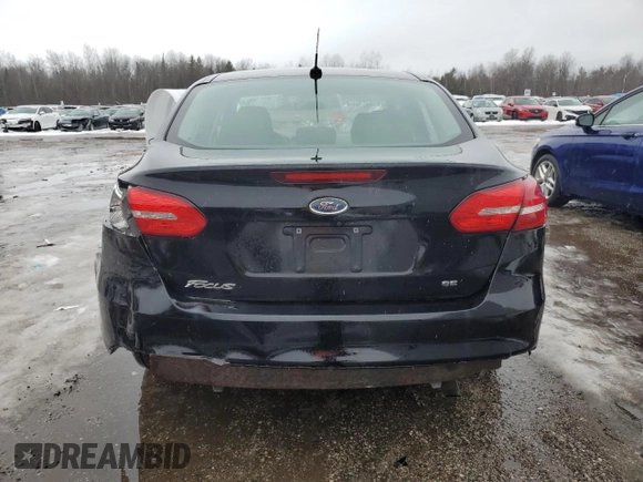 2017 Ford Focus SE с VIN 1FADP3F29HL265488, выставлен на аукционе Copart как лот 46978045 с пробегом 214 535 миль миль и Списание • Salvage title. История ставок и продаж доступна на DreamBid. Изображение 6.