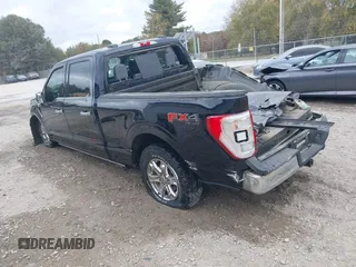 2021 Ford F-150 XL with VIN 1FTFW1E51MFD03486, listed as a IAAI auction lot 40733759 with 66,537 mi miles and . Bid and sale history available at DreamBid. Image 3.