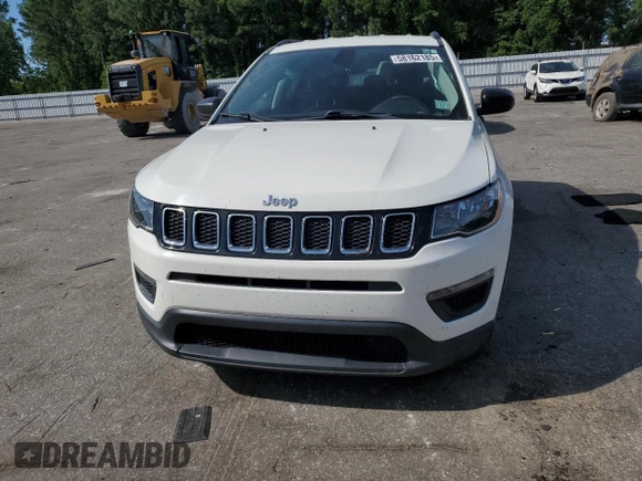 2018 Jeep Compass Sport with VIN 3C4NJCAB7JT140622, listed as a Copart auction lot 58162185 with 128,686 mi miles and Salvage title. Bid and sale history available at DreamBid. Image 5.