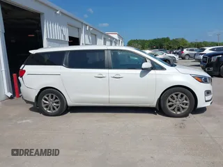 2021 Kia Sedona LX with VIN KNDMB5C12M6661917, listed as a IAAI auction lot 42129682 with 80,321 mi miles and . Bid and sale history available at carsss.com. Image 13.
