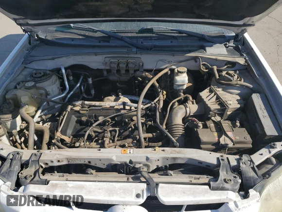 2005 Mazda Tribute i with VIN 4F2YZ02Z95KM24700, listed as a Copart auction lot 42002775 with 128,891 mi miles and Salvage Title. Bid and sale history available at carsss.com. Image 11.