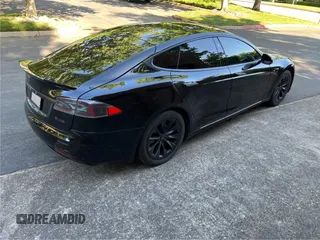 2017 Tesla Model S 60 with VIN 5YJSA1E15HF219286, listed as a Copart auction lot 57360515 with 44,520 mi miles and Salvage title. Bid and sale history available at DreamBid. Image 4.