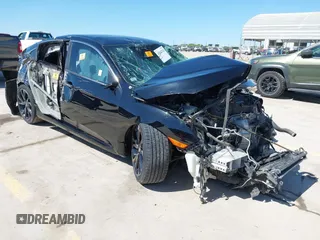 2019 Honda Civic Sport with VIN 19XFC2F89KE051016, listed as a IAAI auction lot 42042322 with 36,775 mi miles and . Bid and sale history available at DreamBid. Image 1.