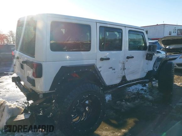 2014 Jeep Wrangler Unlimited Sahara with VIN 1C4HJWEG2EL273813, listed as a IAAI auction lot 41311011 with 96,104 mi miles. Bid and sale history available at carsss.com. Image 4.
