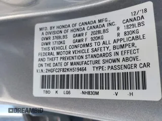 2019 Honda Civic Sedan Sport with VIN 2HGFC2F82KH519464, listed as a IAAI auction lot 41940030 with 59,718 mi miles. Bid and sale history available at carsss.com. Image 9.
