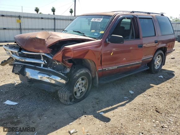 1999 Chevrolet Tahoe Z71 with VIN 1GNEK13R0XJ474557, listed as a Copart auction lot 74971964 with 217,027 mi miles and Salvage Title. Bid and sale history available at carsss.com. Image 1.