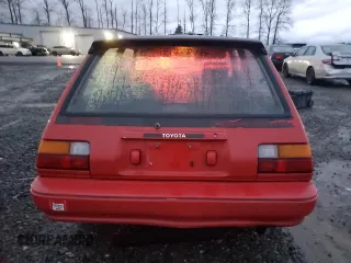 1987 Toyota Corolla с VIN 1NXAE89G0HZ406025, выставлен на аукционе Copart как лот 86453694 с пробегом 210 704 миль миль и Списание • Salvage title. История ставок и продаж доступна на DreamBid. Изображение 6.