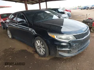 2018 Kia Optima LX with VIN 5XXGT4L39JG251635, listed as a IAAI auction lot 41933408 with 135,718 mi miles. Bid and sale history available at carsss.com. Image 1.