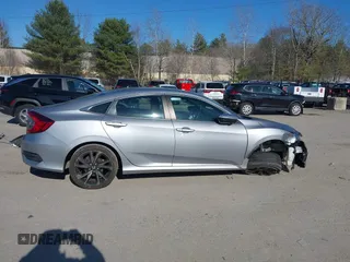 2019 Honda Civic Sport with VIN 2HGFC2F8XKH602463, listed as a IAAI auction lot 41966052 with 95,416 mi miles and . Bid and sale history available at DreamBid. Image 13.