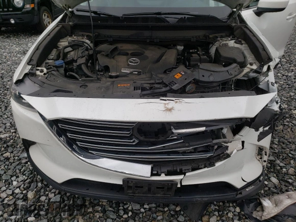2022 Mazda CX-9 Touring with VIN JM3TCBCYXN0619317, listed as a Copart auction lot 58264755 with 139,478 mi miles and Salvage title. Bid and sale history available at DreamBid. Image 12.