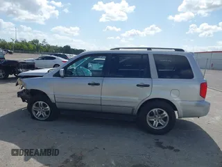 2003 Honda Pilot EX with VIN 2HKYF18603H504829, listed as a IAAI auction lot 42083247 with 247,429 mi miles and . Bid and sale history available at carsss.com. Image 14.