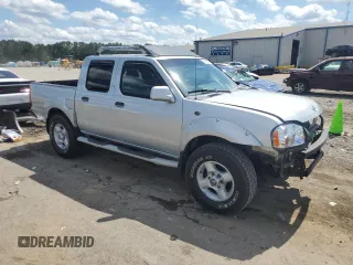 2001 Nissan Frontier SE with VIN 1N6ED27T51C311894, listed as a Copart auction lot 56281465 with 151,361 mi miles and Salvage title. Bid and sale history available at DreamBid. Image 4.