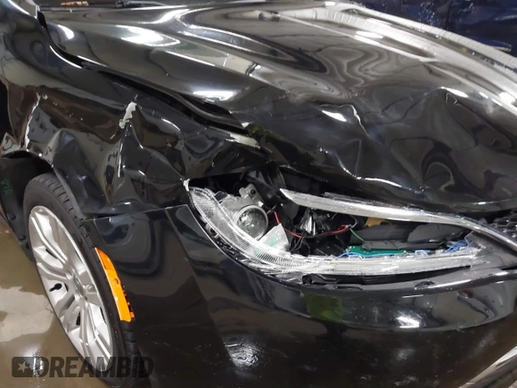 2015 Chrysler 200 Limited with VIN 1C3CCCAB9FN690174, listed as a IAAI auction lot 41330163 with 123,633 mi miles and . Bid and sale history available at carsss.com. Image 6.