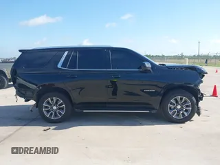 2023 Chevrolet Tahoe LT z VIN 1GNSCNKDXPR477061, wystawiony jako IAAI lot #42225743 z przebiegiem 57 077 mil mil oraz . Historia ofert i sprzedaży dostępna na DreamBid. Obrazek 13.