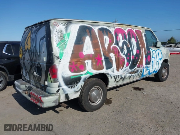 2002 Ford Econoline Cargo with VIN 1FTNE24L42HB67506, listed as a IAAI auction lot 42056517 with 197,394 mi miles and . Bid and sale history available at DreamBid. Image 4.