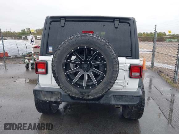 2019 Jeep Wrangler Unlimited Sport Altitude with VIN 1C4HJXDG3KW528647, listed as a IAAI auction lot 40986538 with 85,381 mi miles and . Bid and sale history available at DreamBid. Image 17.