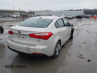 2015 Kia Forte LX with VIN KNAFK4A66F5291465, listed as a IAAI auction lot 41515671 with 102,032 mi miles. Bid and sale history available at carsss.com. Image 4.