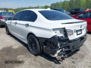 2013 BMW 5 Series 528i xDrive with VIN WBAXH5C52DD113388, listed as a IAAI auction lot 41997250 with 145,990 mi miles and . Bid and sale history available at carsss.com. Image 3.