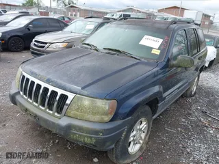 2003 Jeep Grand Cherokee Laredo with VIN 1J4GW48S63C591605, listed as a IAAI auction lot 41973681 with 177,024 mi miles. Bid and sale history available at carsss.com. Image 6.