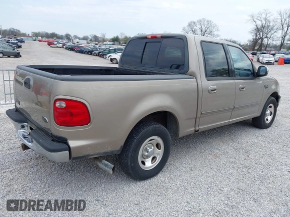 2001 Ford F-150 XLT with VIN 1FTRW07W01KB64001, listed as a IAAI auction lot 41903682 with 175,396 mi miles and . Bid and sale history available at DreamBid. Image 4.