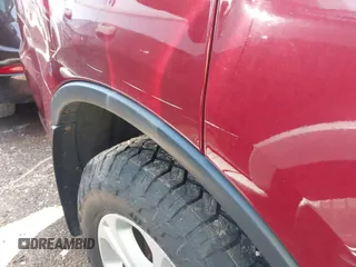 2013 Dodge Durango SXT with VIN 1C4RDJAG4DC527945, listed as a IAAI auction lot 41590545 with 141,074 mi miles and . Bid and sale history available at DreamBid. Image 18.